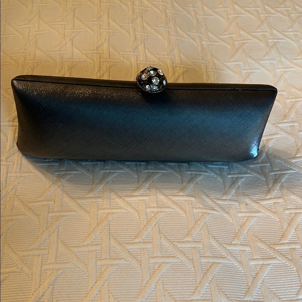 Dark grey Leather Clutch with Metallic Clasp. NWT
